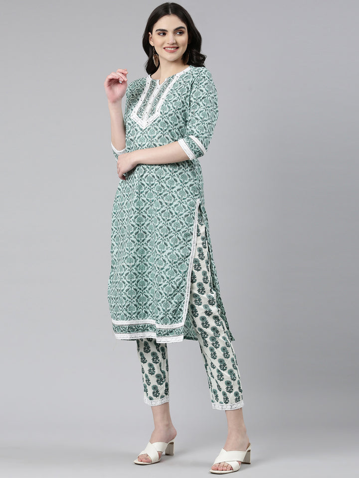 Neerus Green cotton printed kurta set with trouser and dupatta - back view