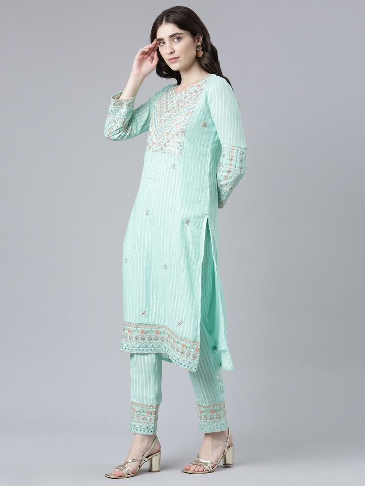 Neerus Green cotton printed kurta set with trouser and dupatta - back view
