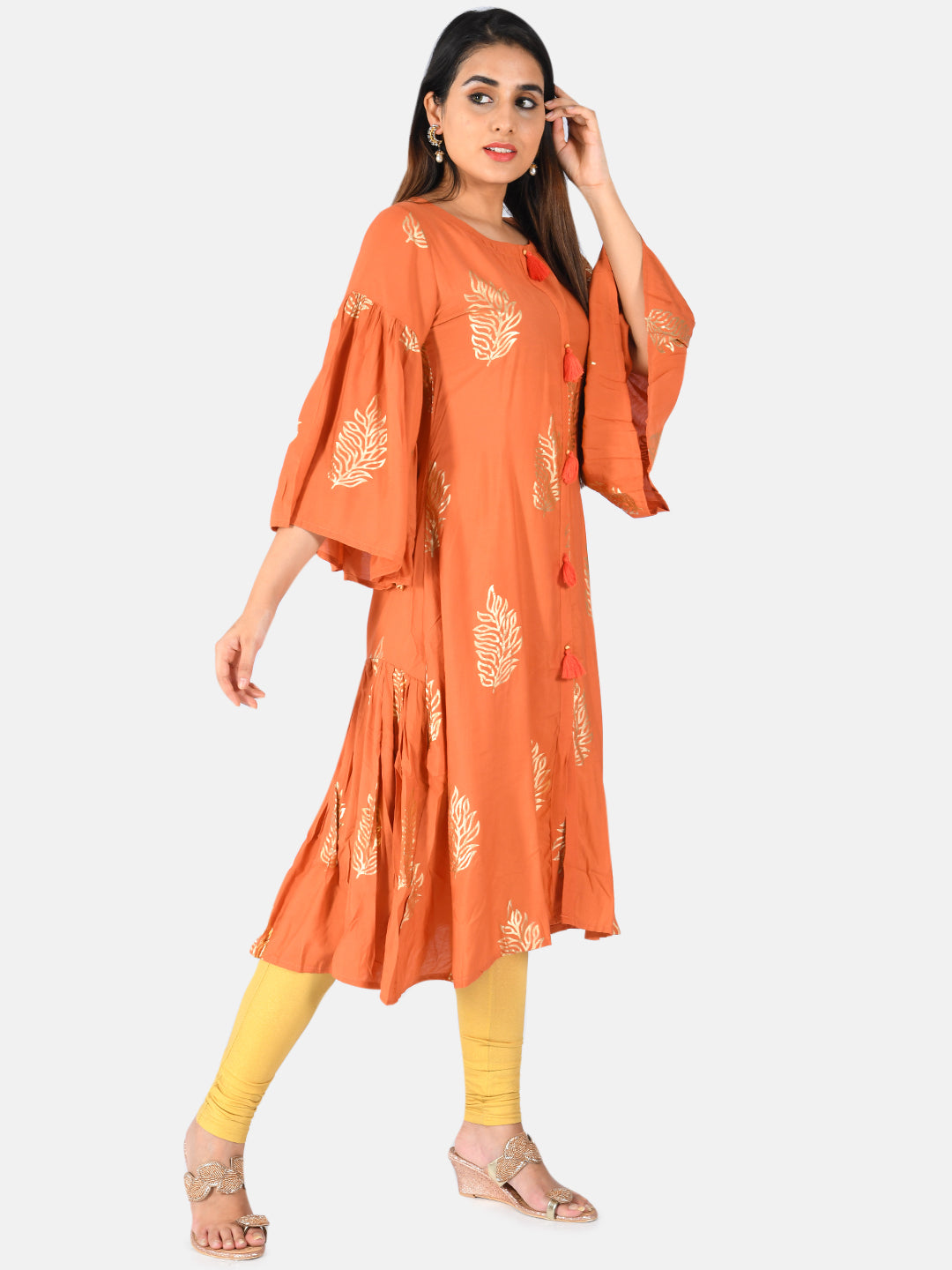 Neerus Orange muslin solid kurti - back view