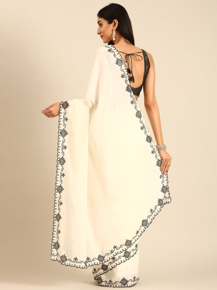 Cream satin saree with Swarovski embroidered border