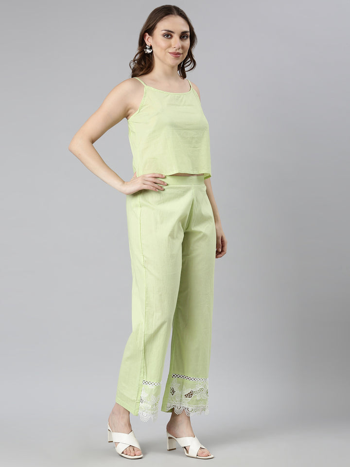 Neerus Green cotton printed kurta set with trousers - back view