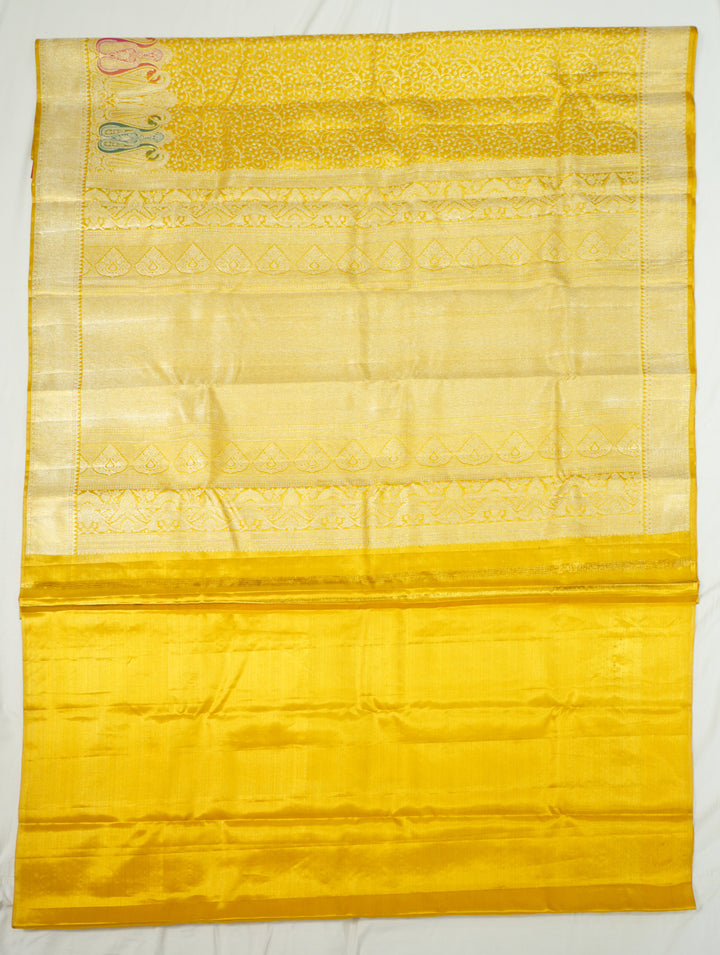 Yellow Kanchi Pattu Handwoven Saree With Resham And Zari Border