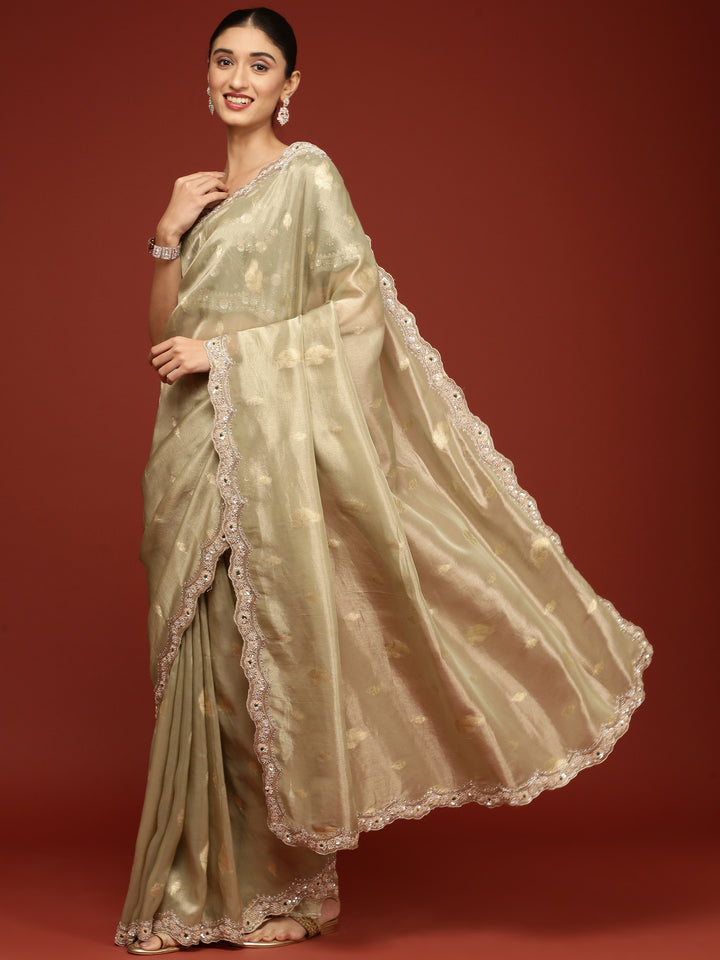 Pista Green Tissue Weaved Saree With Stone Work Readymade Blouse