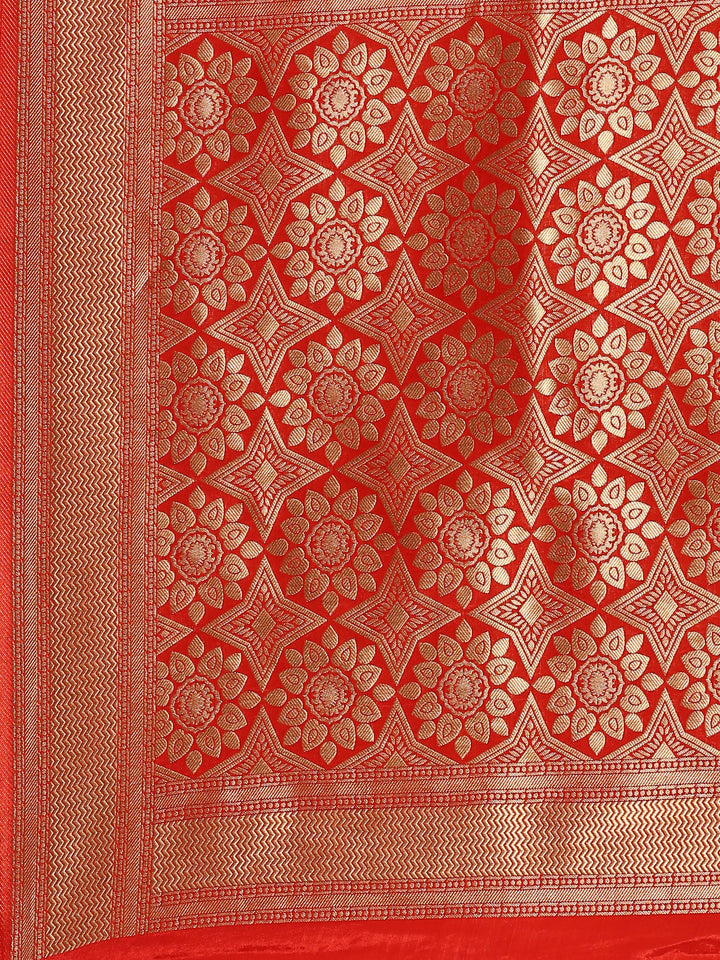 Red and gold silk saree with peacock booti pallu