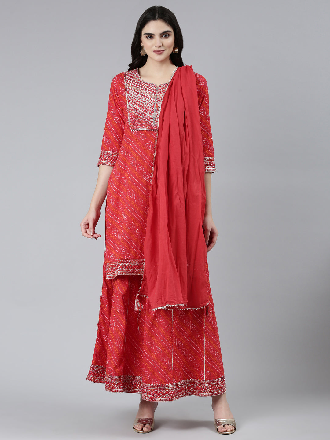 Neerus Red Bandhani printed kurta set with palazzo and dupatta - front view