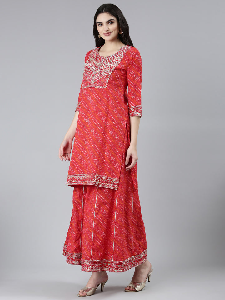 Neerus Red Bandhani printed kurta set with palazzo and dupatta - back view