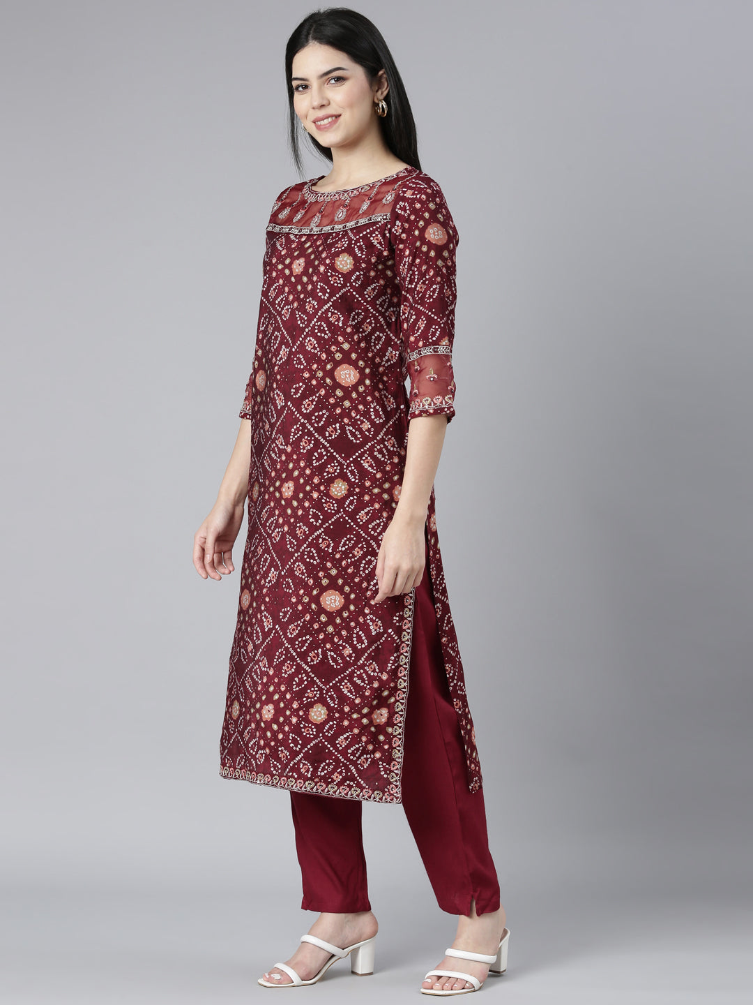 Neerus Maroon Bandhani printed kurta set with trouser and dupatta - back view