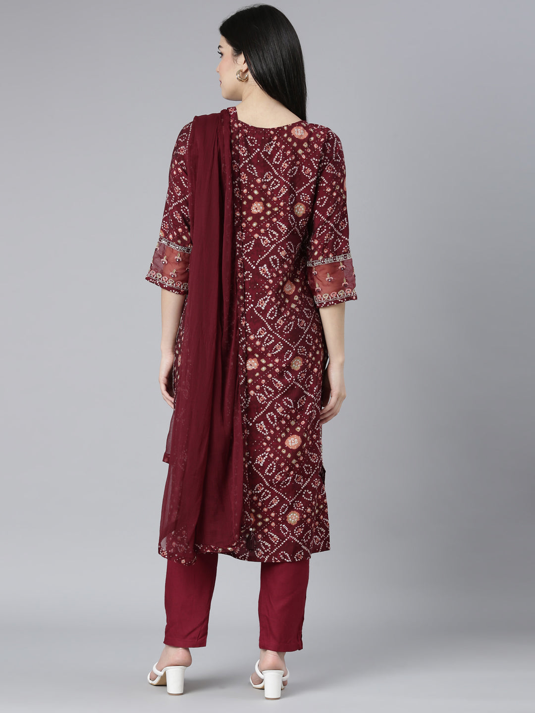 Neerus Maroon Bandhani printed kurta set with trouser and dupatta - side view