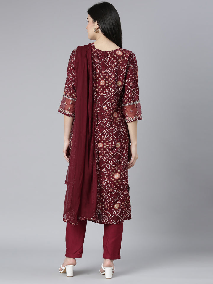Neerus Maroon Bandhani printed kurta set with trouser and dupatta - side view
