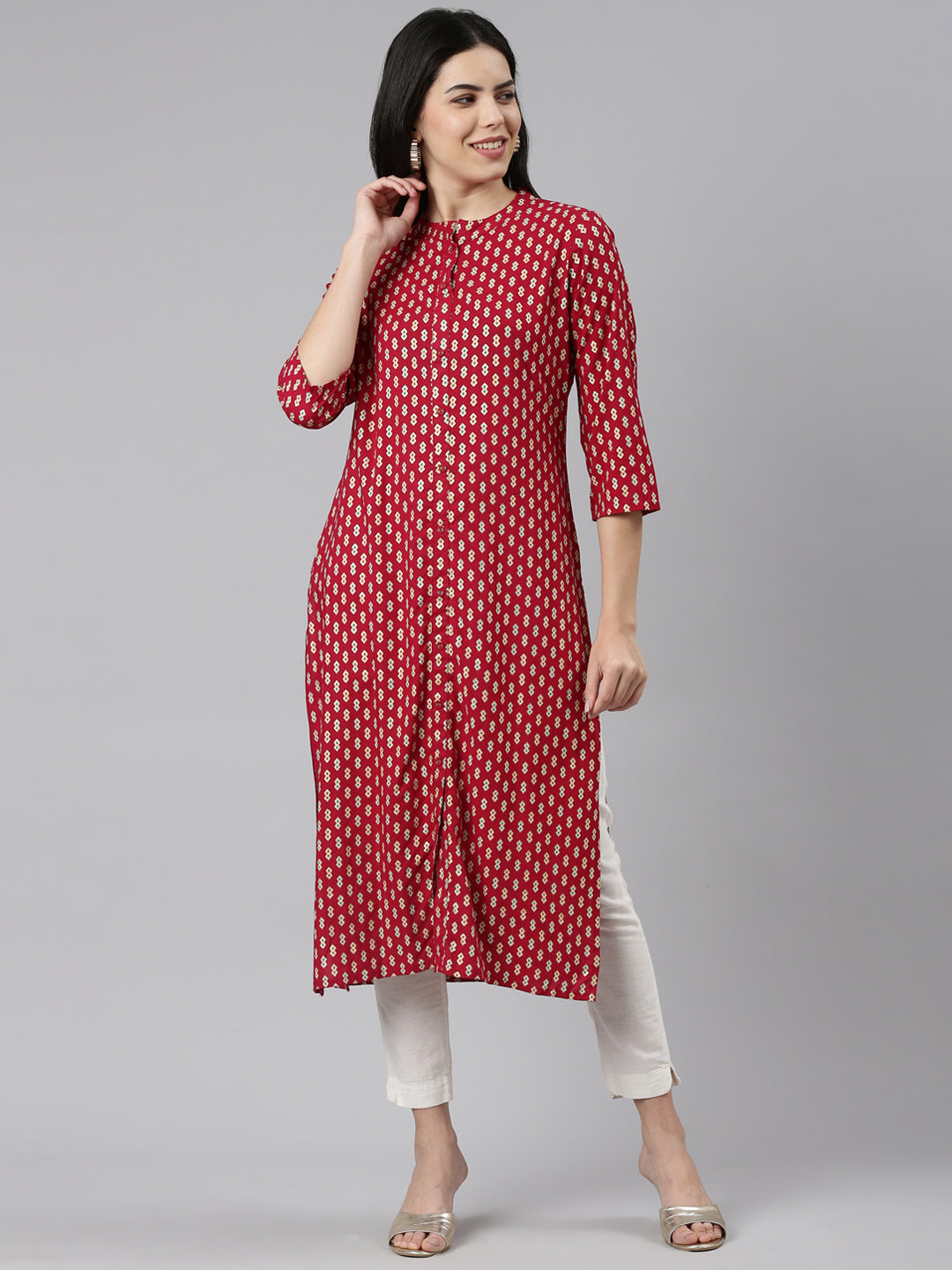 Neerus Maroon rayon printed straight kurti - front view