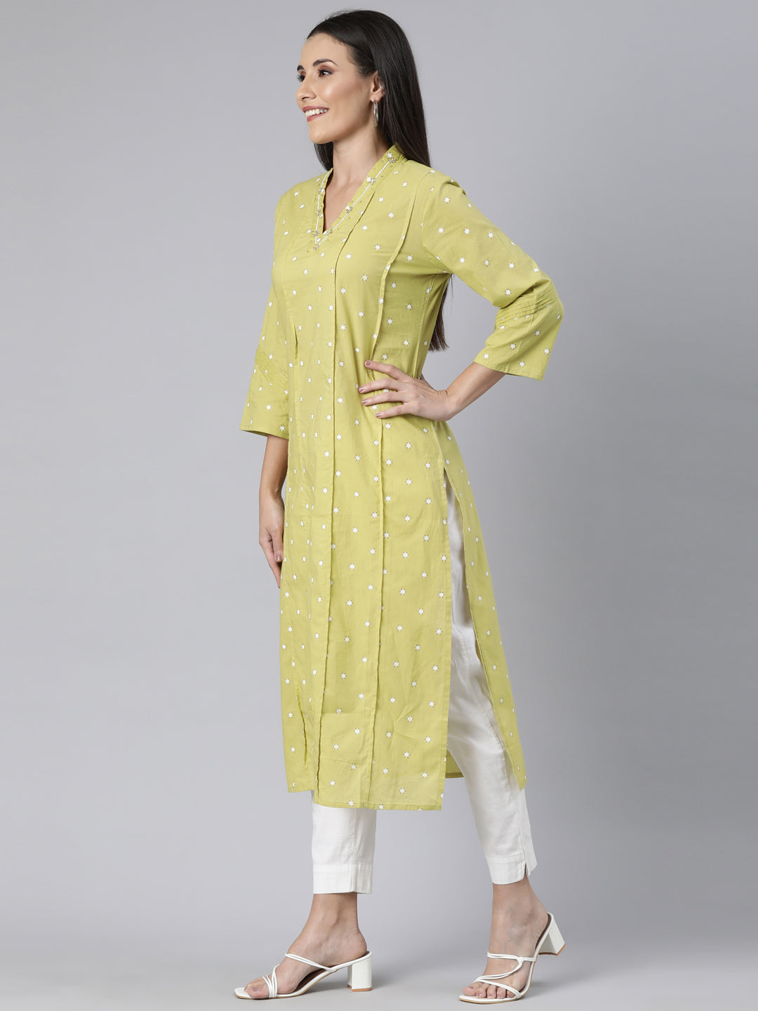 Neerus Green cotton printed panelled straight kurti - back view
