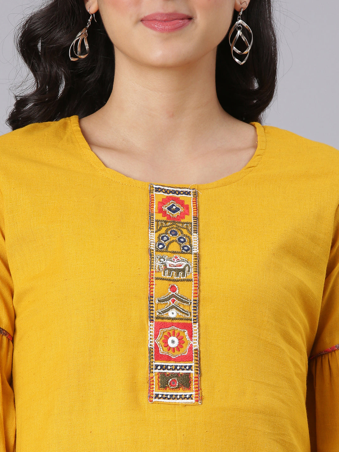 Neerus Mustard Solid Straight Kurta And Trousers