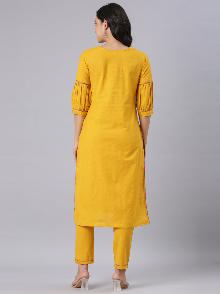 Neerus Mustard Solid Straight Kurta And Trousers