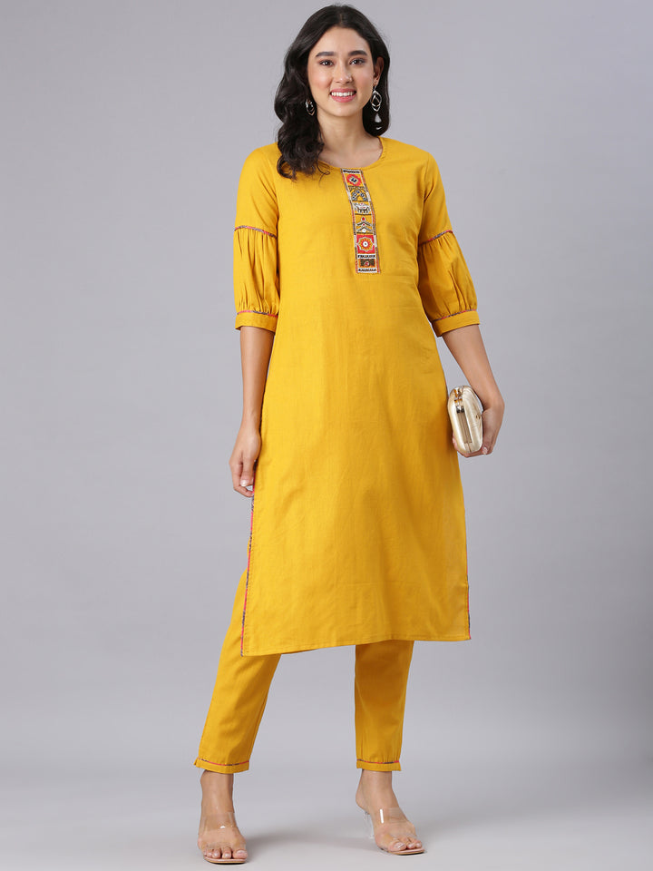 Neerus Mustard Solid Straight Kurta And Trousers
