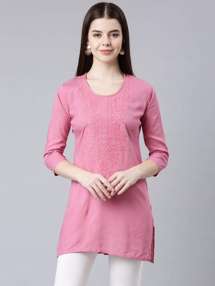 Neerus Pink rayon solid straight kurti - front view