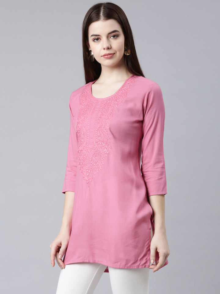 Neerus Pink rayon solid straight kurti - back view