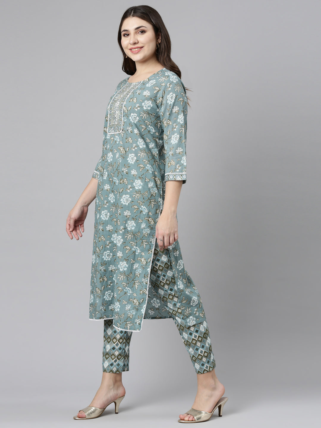 Neerus Green cotton printed kurta set with trouser and dupatta - back view