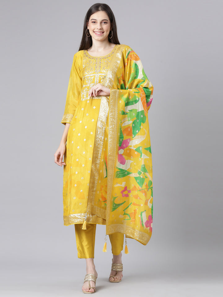Neerus Mustard Solid Straight Kurta and Trousers With Dupatta