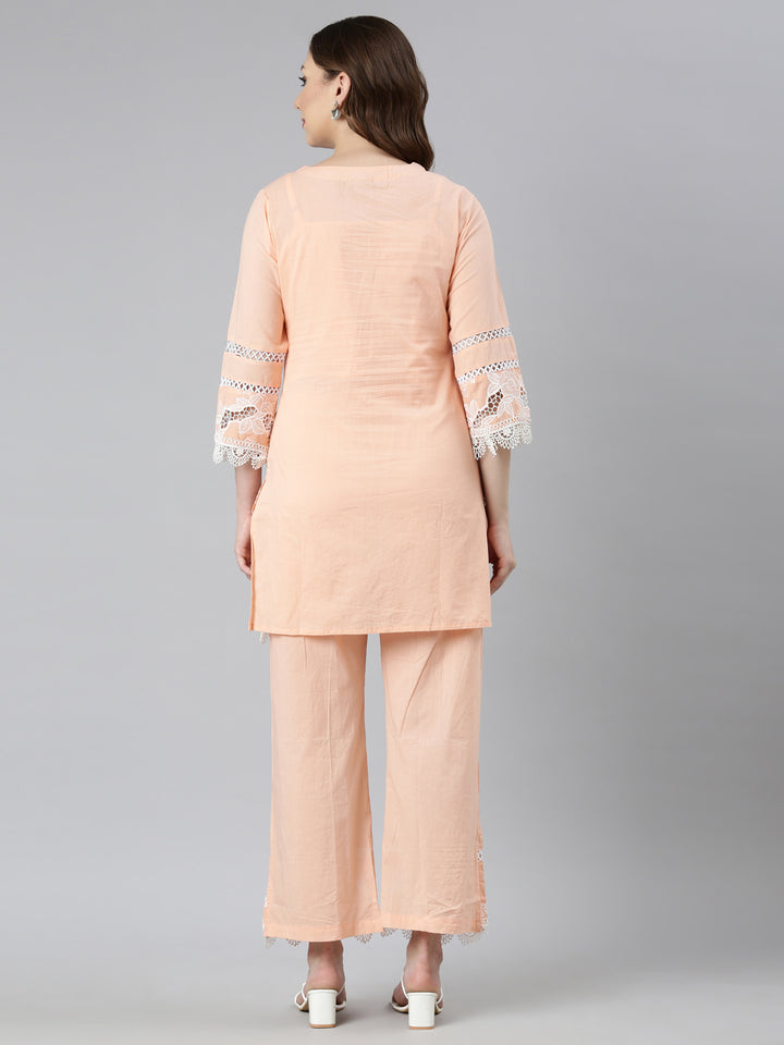 Neerus Peach Regular Straight Floral Kurti And Trousers