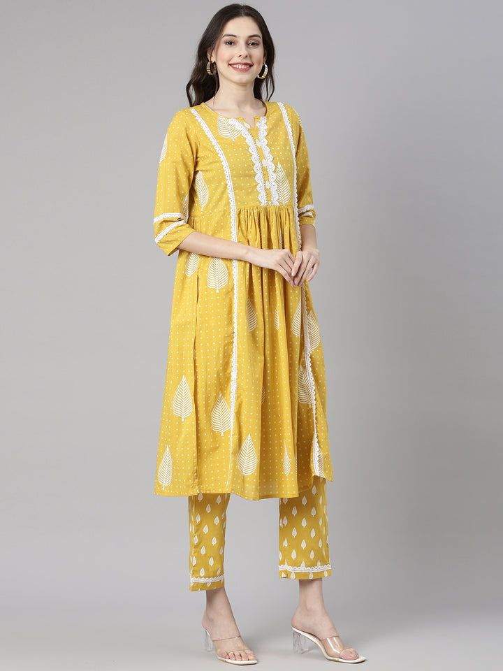 Neerus Yellow Printed Straight Kurta and Trousers With Dupatta and with bag