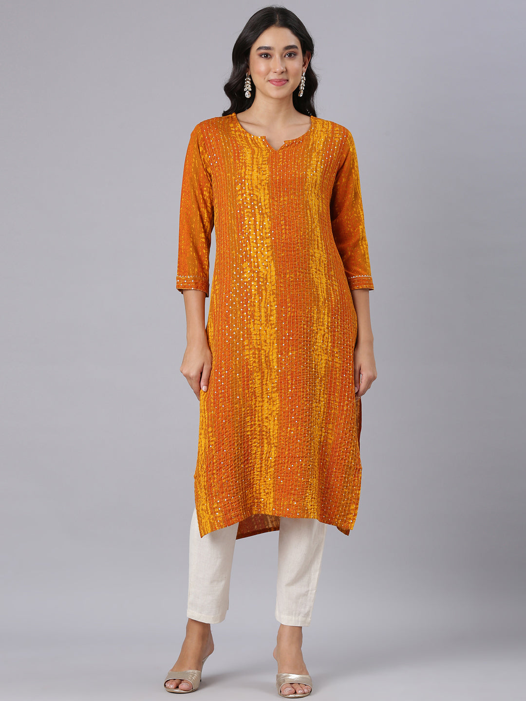 Neerus Gold Straight Casual Solid Kurtas