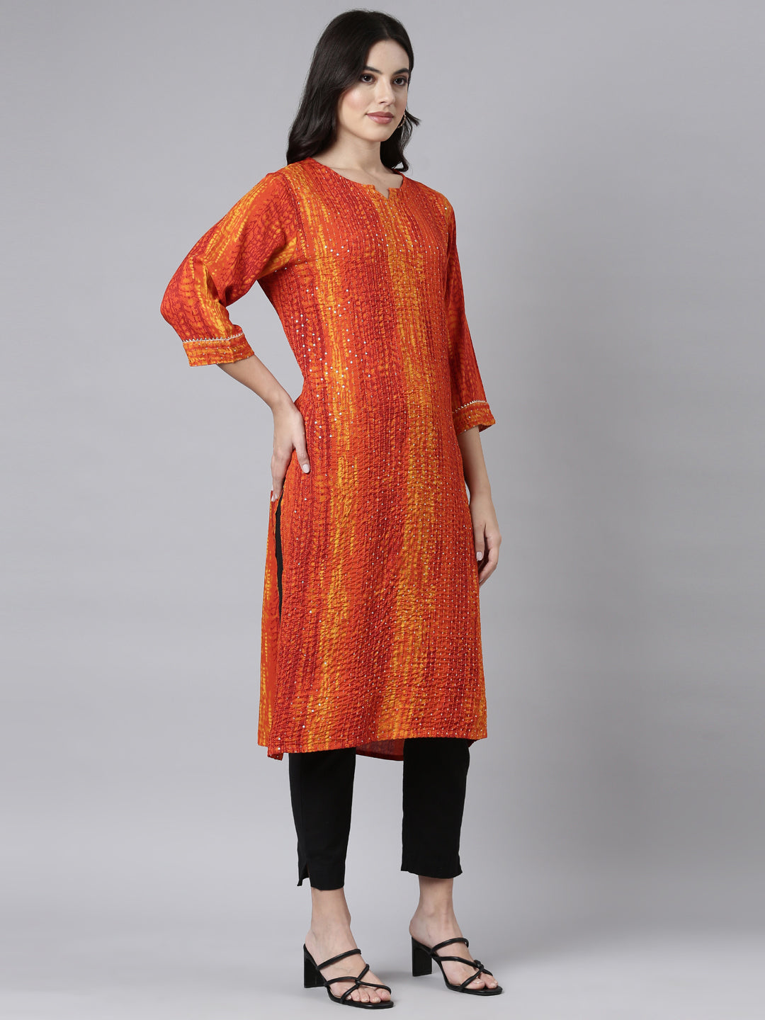 Neerus Orange embellished straight kurti - back view