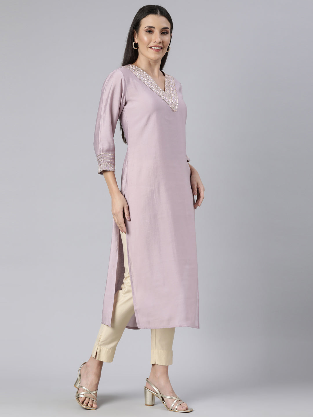 Neerus Purple solid straight kurti - back view