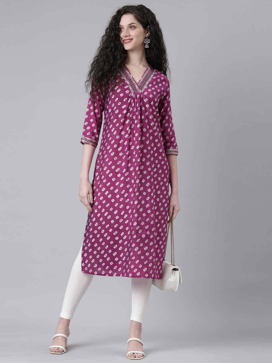 Neerus Purple cotton solid straight kurta - front view