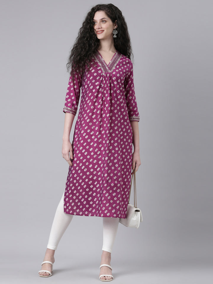 Neerus Purple cotton solid straight kurta - front view