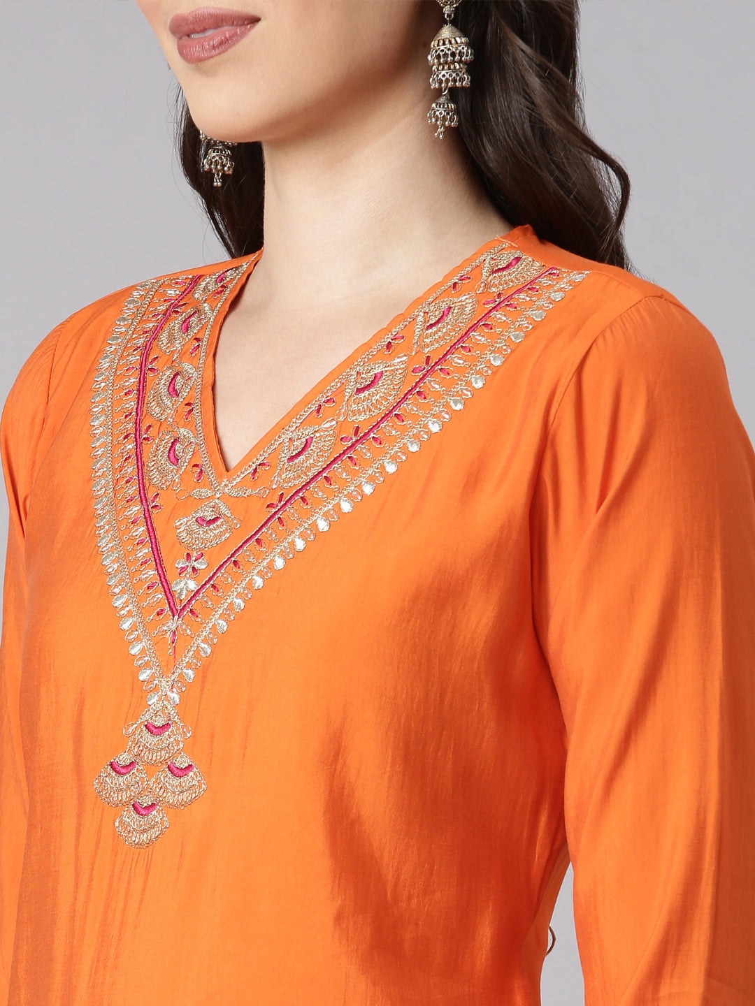 Neerus Orange Solid Straight Kurta and Trousers With Dupatta