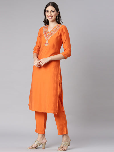 Neerus Orange Solid Straight Kurta and Trousers With Dupatta