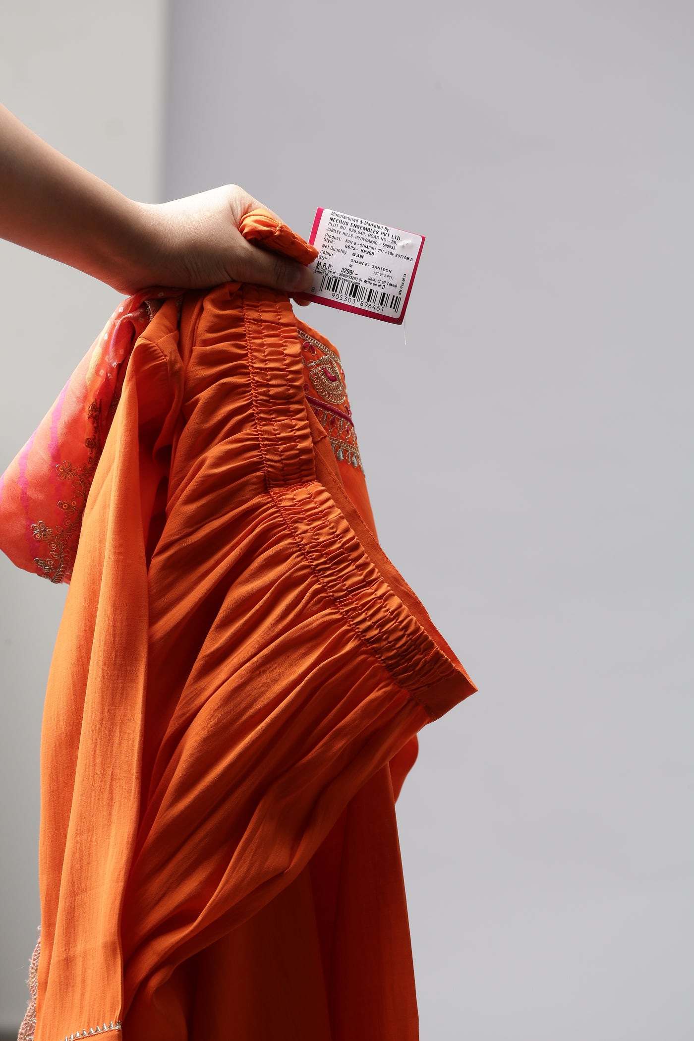 Neerus Orange Solid Straight Kurta and Trousers With Dupatta