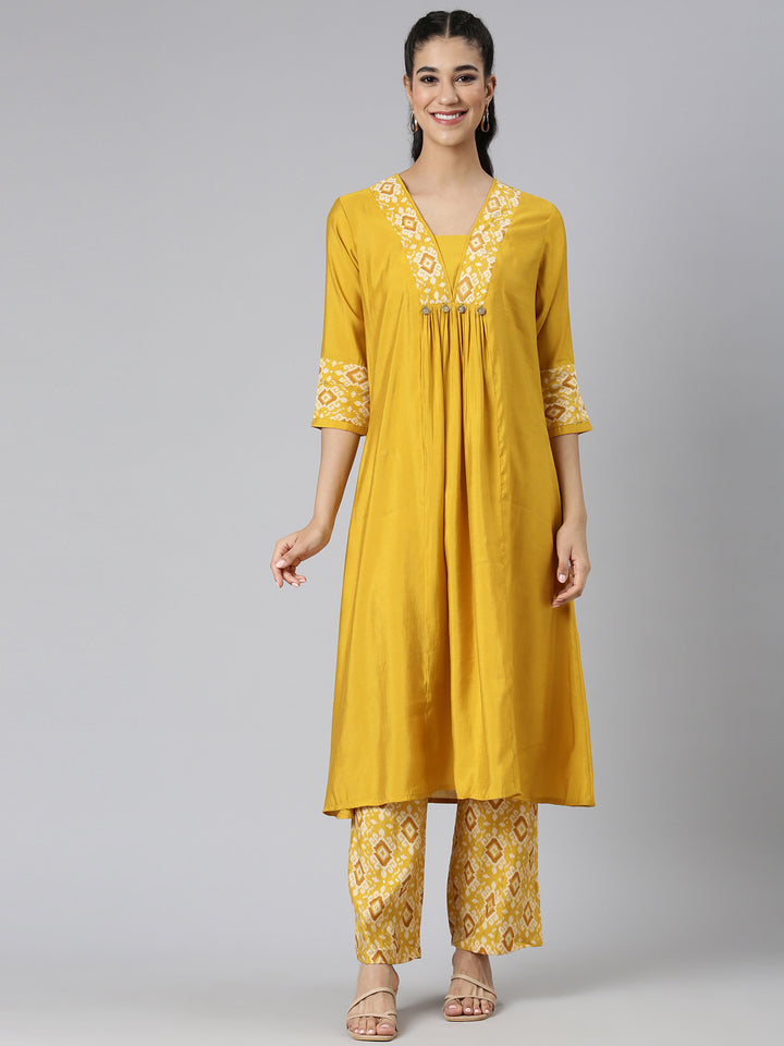 Neerus Yellow Solid Straight Kurta and Trousers