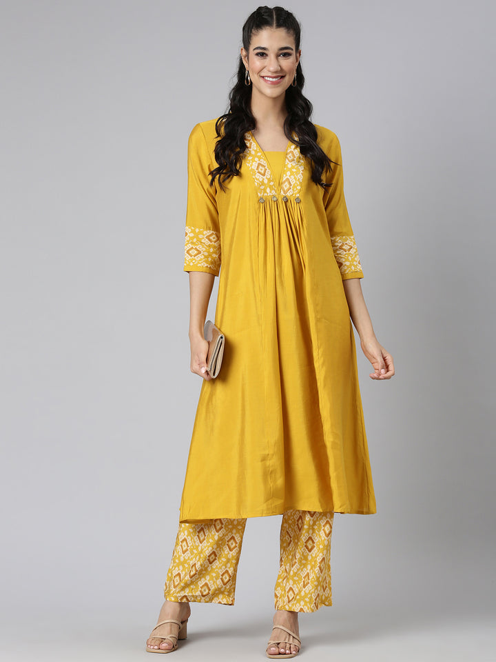 Neerus Yellow Solid Straight Kurta and Trousers
