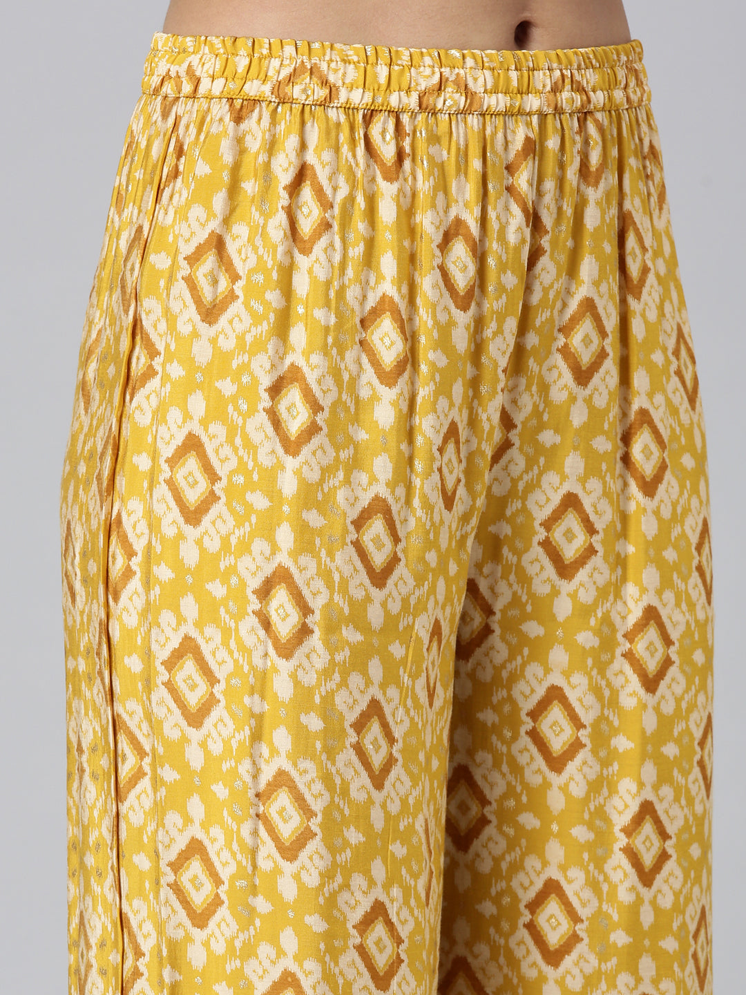 Neerus Yellow Solid Straight Kurta and Trousers