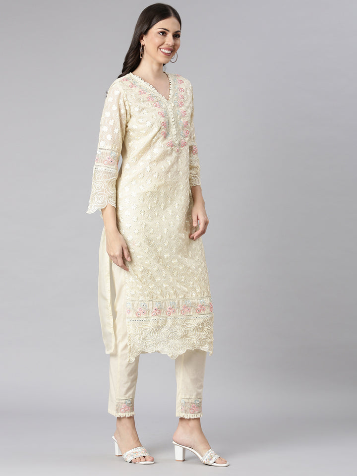 Neerus Cream Self Design Straight Kurta and Trousers With Dupatta