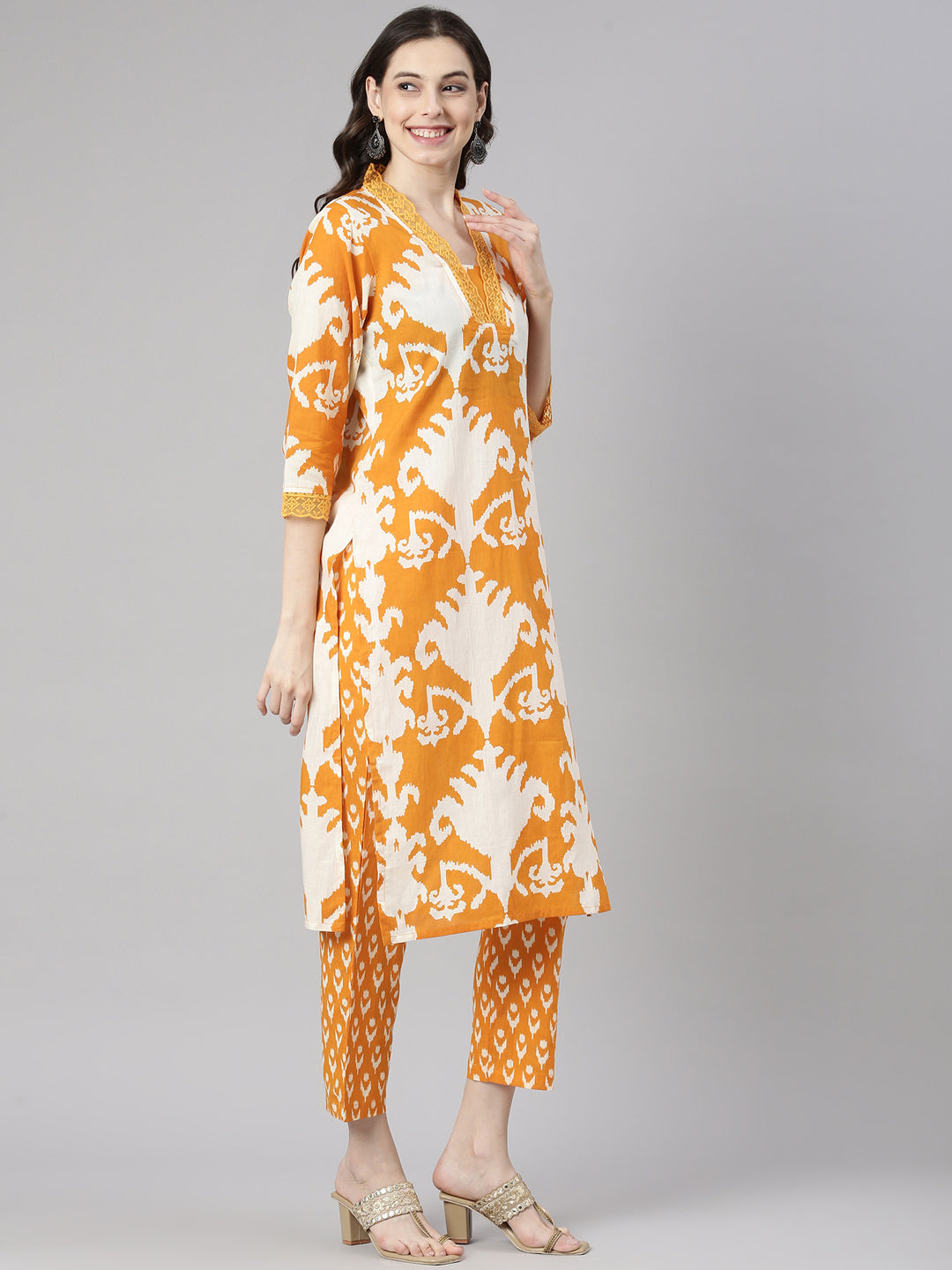 Neerus Mustard Printed Straight Kurta and Trousers