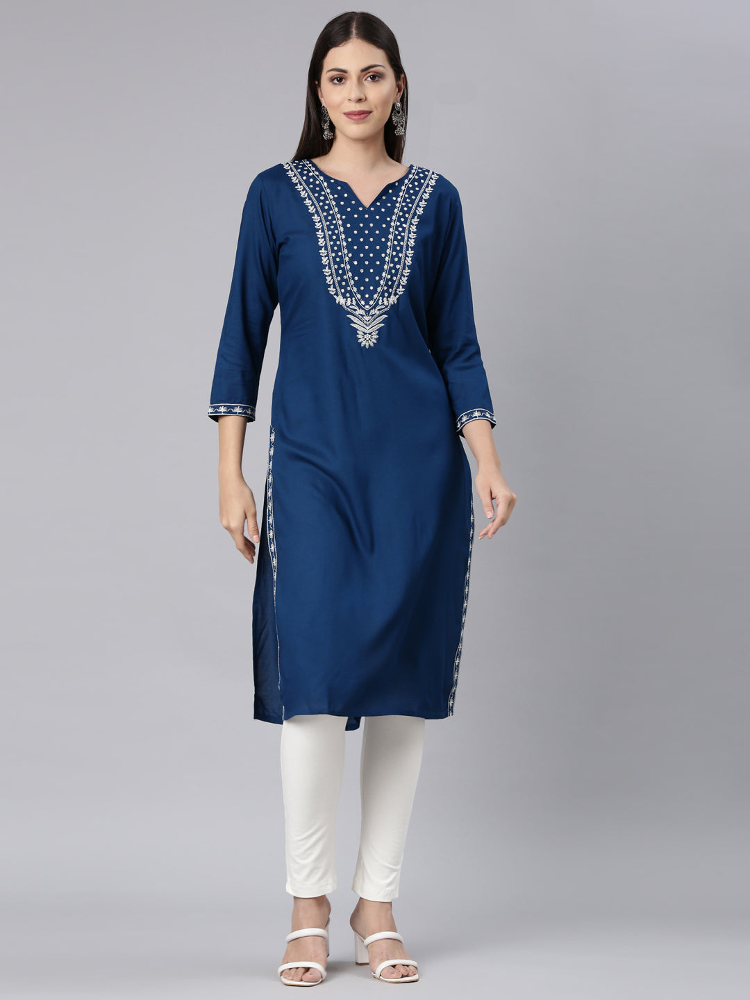 Neerus Blue rayon solid straight kurti - front view