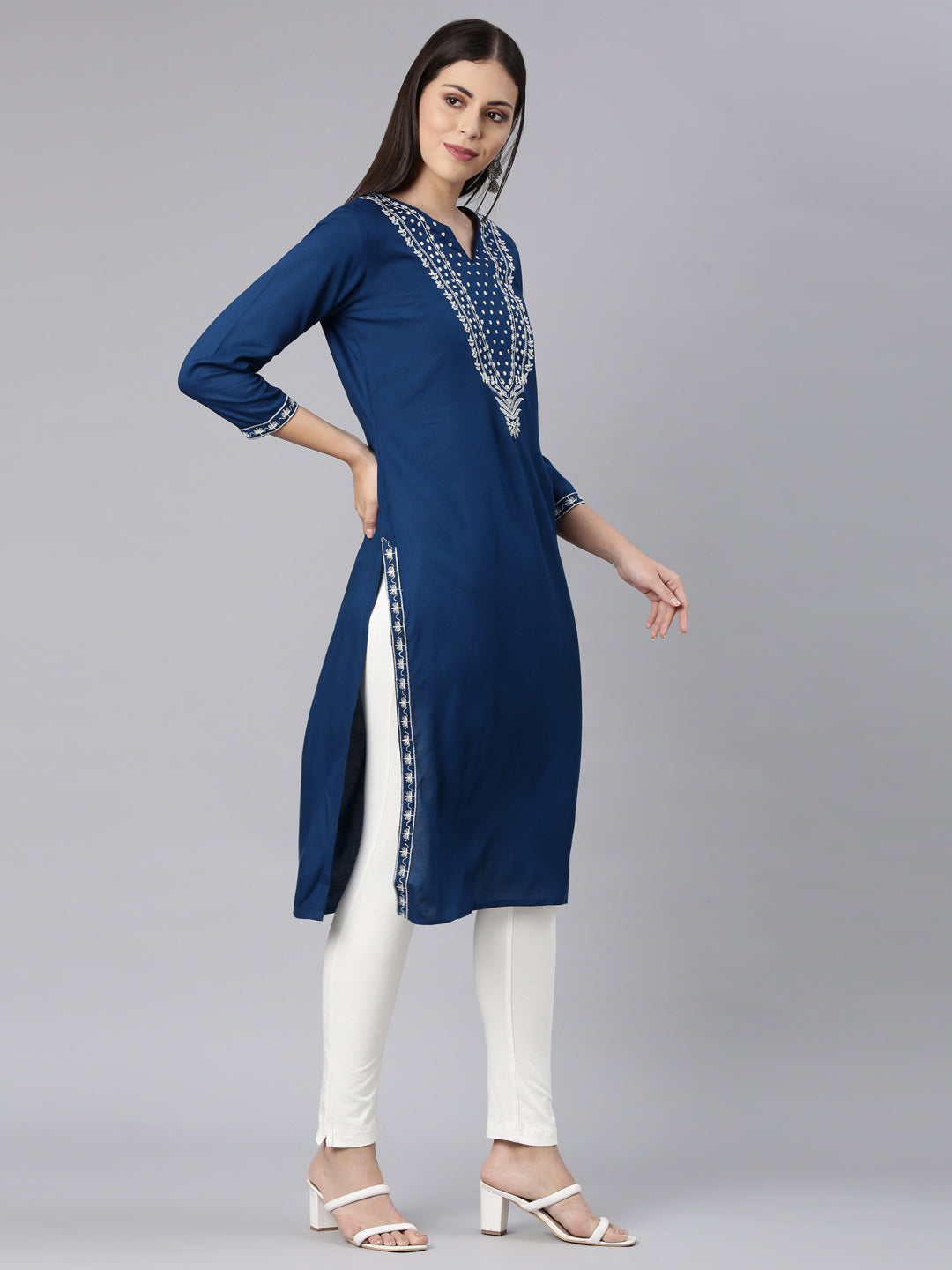 Neerus Blue rayon solid straight kurti - side view