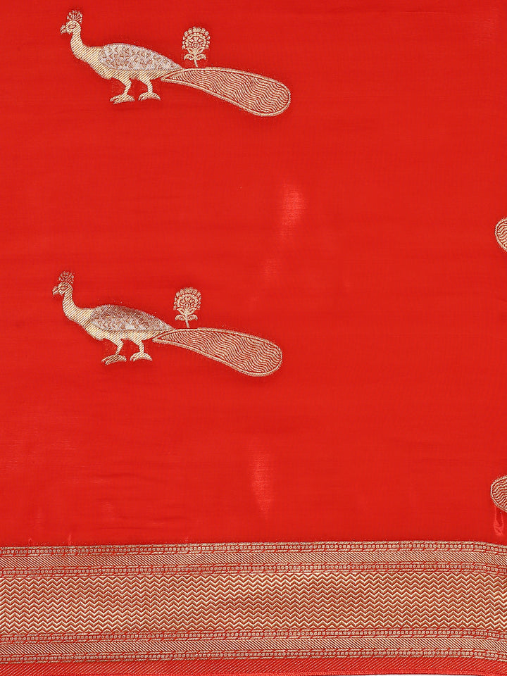 Red and gold silk saree with peacock booti pallu