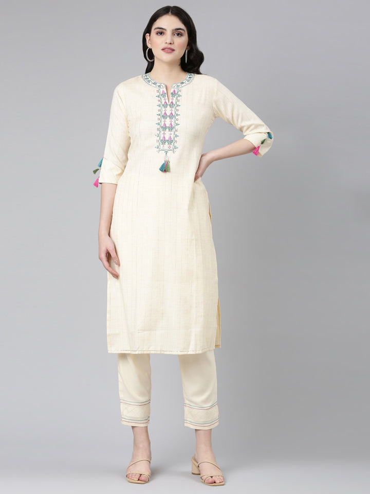 Neerus Cream Regular Straight Solid Kurta And Trousers