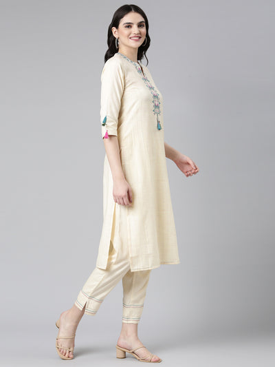 Neerus Cream Regular Straight Solid Kurta And Trousers