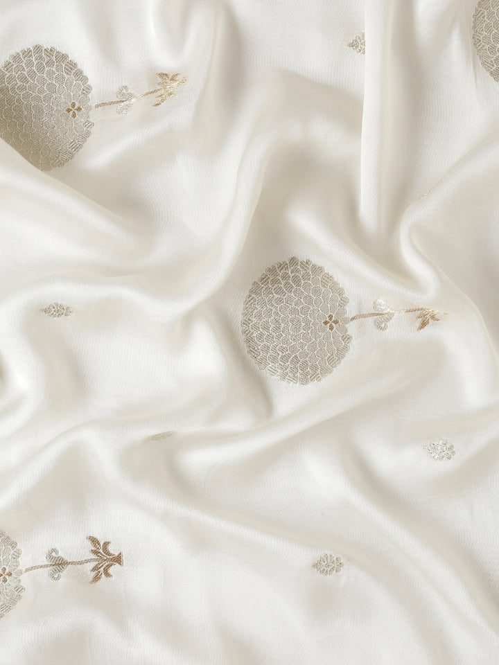 White Banaras silk saree with zari motifs and border