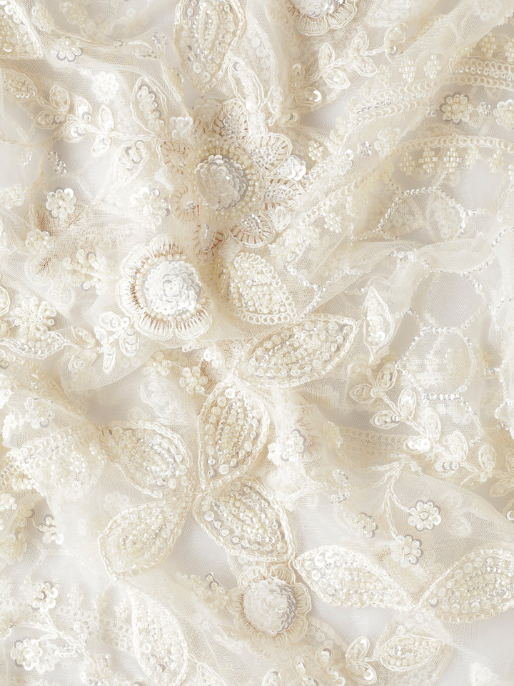 Cream net saree with pearl and sequins hand embroidery with scallop border