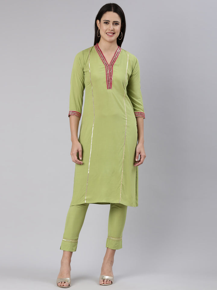 Neerus Green Regular Straight Solid Kurta And Trousers