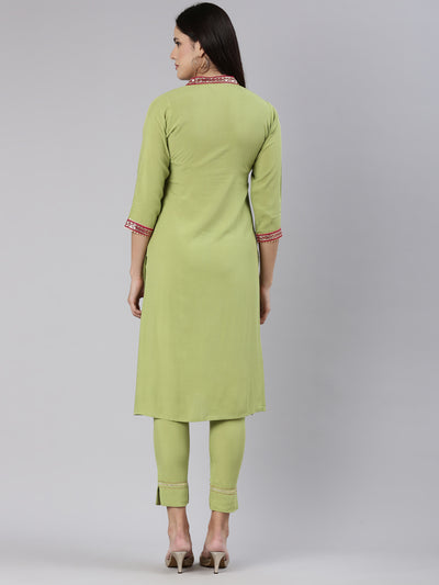 Neerus Green Regular Straight Solid Kurta And Trousers