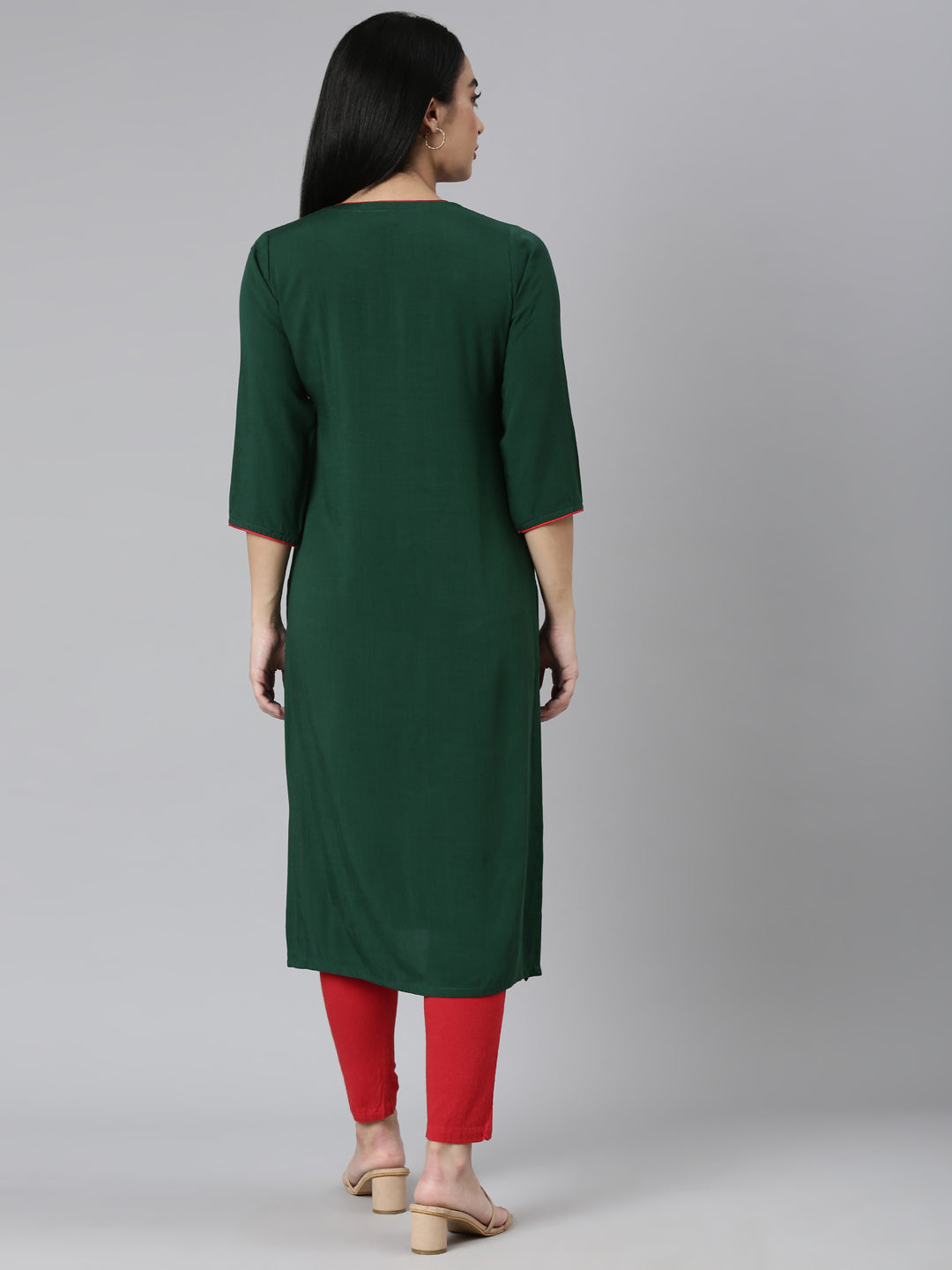 Neerus Green cotton solid straight kurta - side view