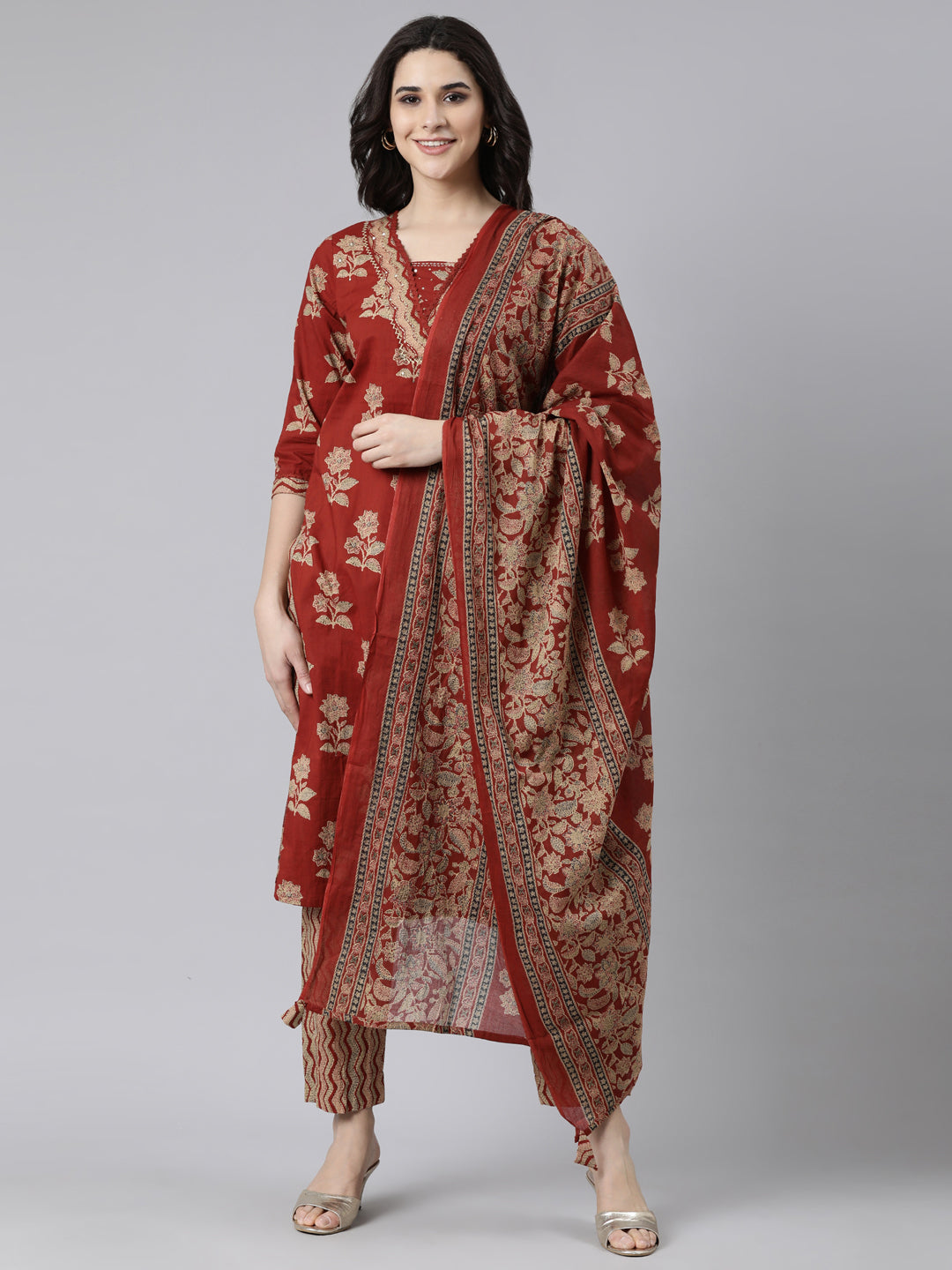 Neerus Orange printed floral suit set straight kurta with trouser and dupatta - front view