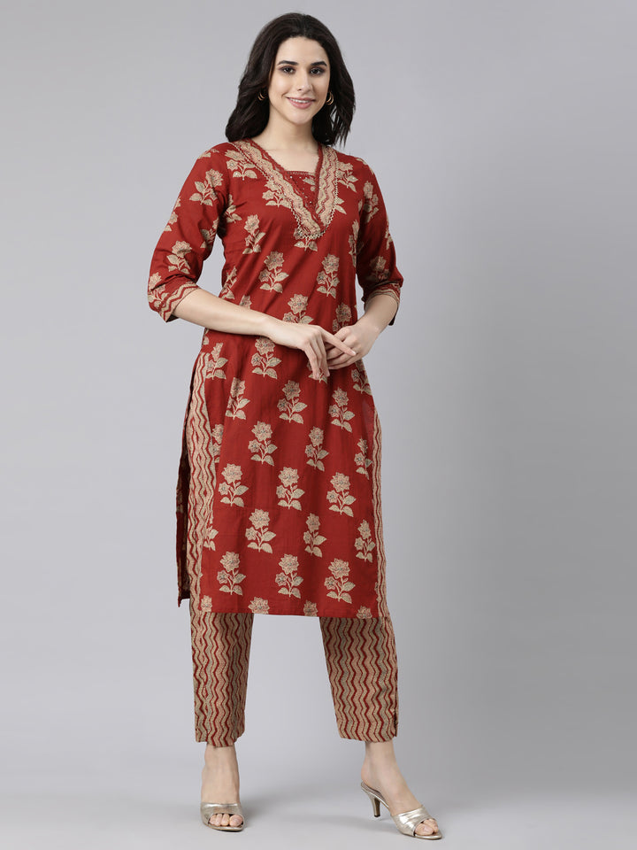 Neerus Orange printed floral suit set straight kurta with trouser and dupatta - back view