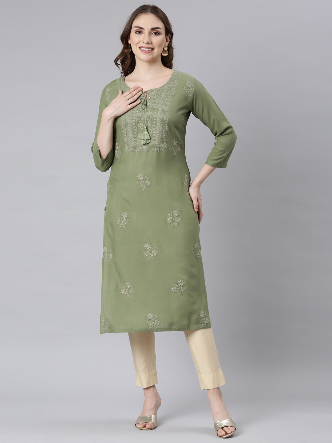 Neerus Green embellished straight kurti panelled - front view